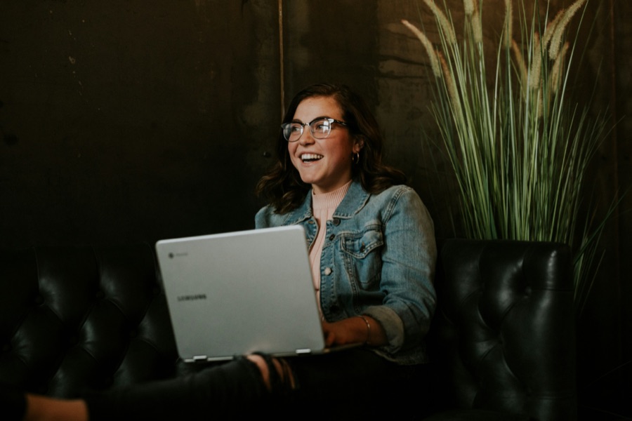 Team collaboration around a laptop